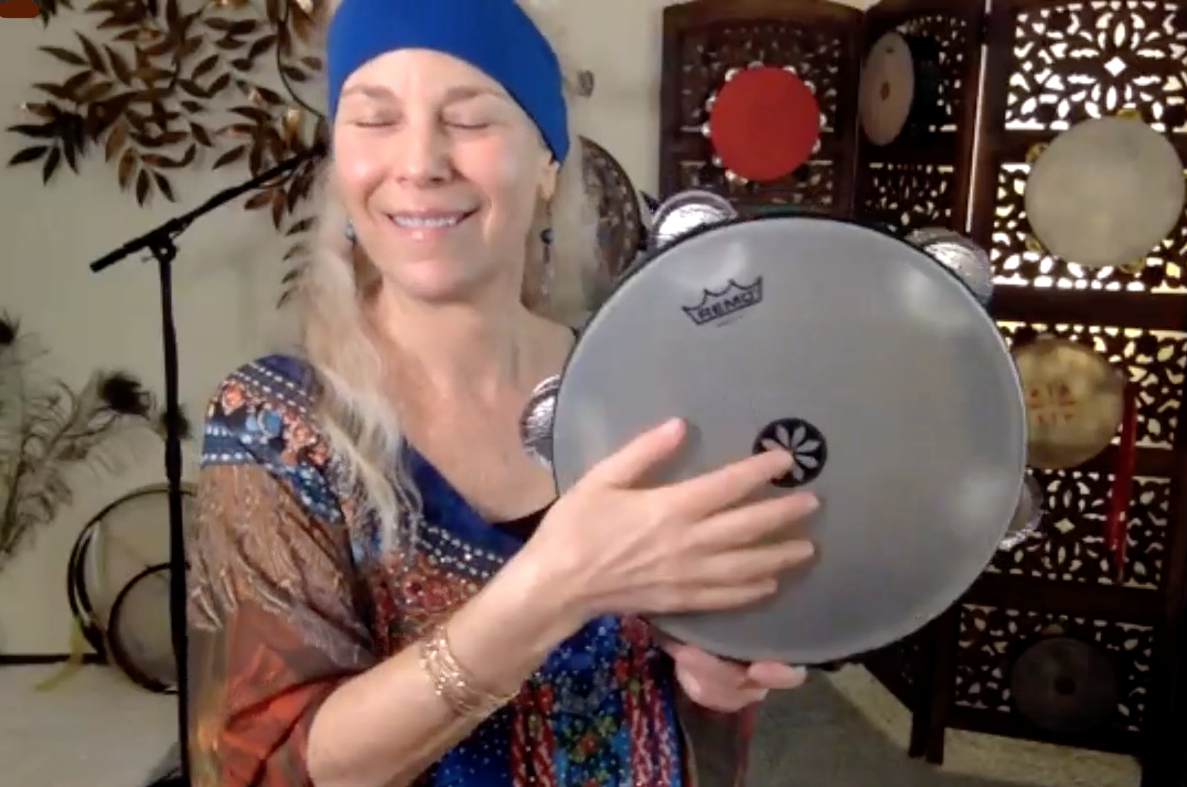 BG with her tambourine in an online Master Class.